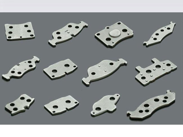 Steel backing plate for brake pads